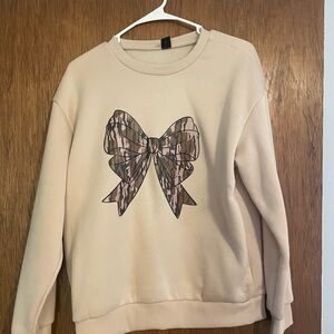 Women's Cream Sweater with Bow Design
